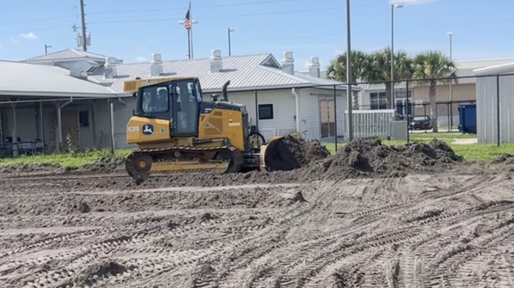 Land grading services in Orlando Fl using bulldozer for building pad and site preparation