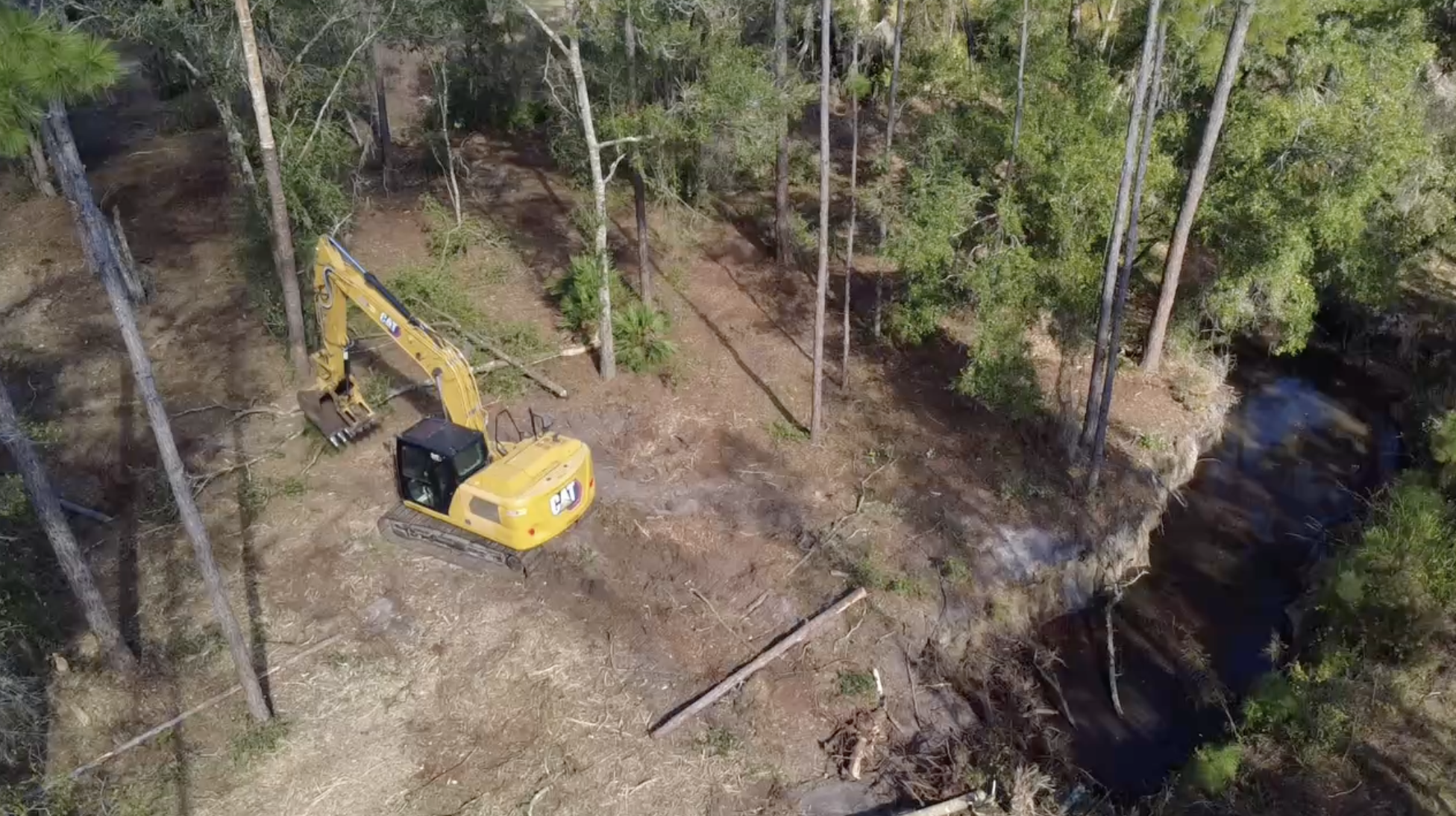 Excavation and site prep for building pad in Central Florida creating level foundation area for construction